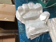 I guanti di plastica eliminabili di una volta/i guanti mano del politene lisciano il tipo impresso